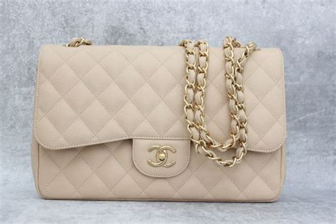 chanel light beige flap bag|Chanel snakeskin flap bag.